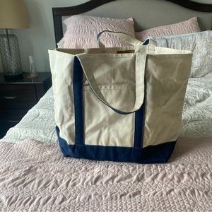G.H. BASS & CO blue open top tote bag with regular handles and inside zip pocket